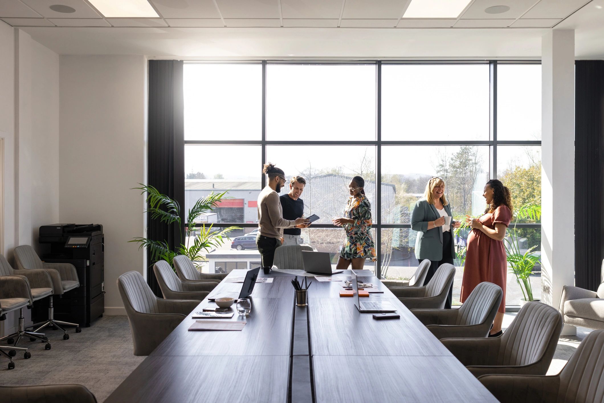 Business partners discussing collaboration in a conference room